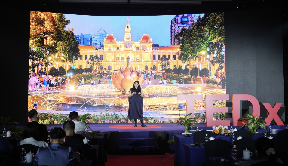 Honor Harger speaking at TEDxSaigon 2026